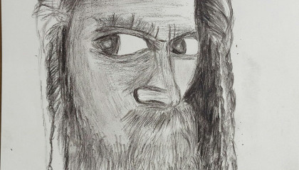 old man drawing with charcoals